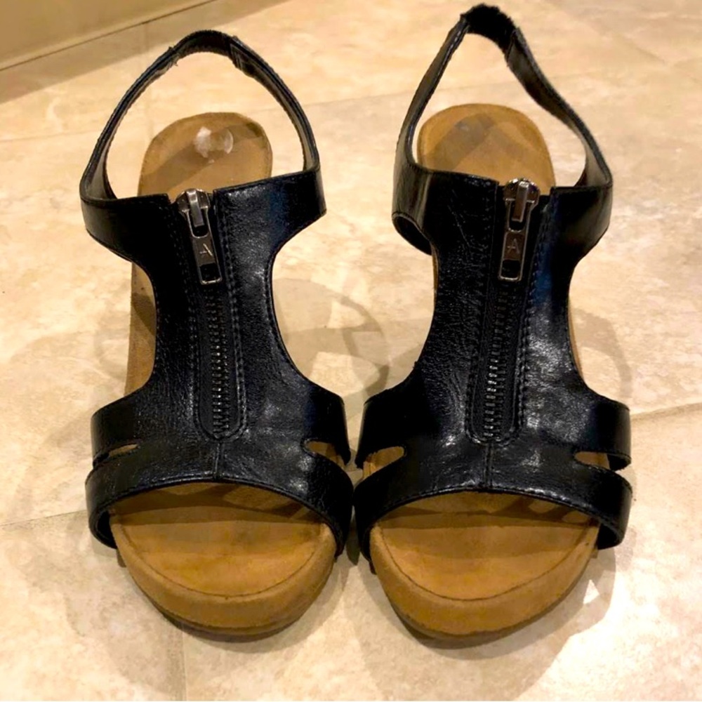 Black Wedge Heels Size 8.5 - Very good condition.